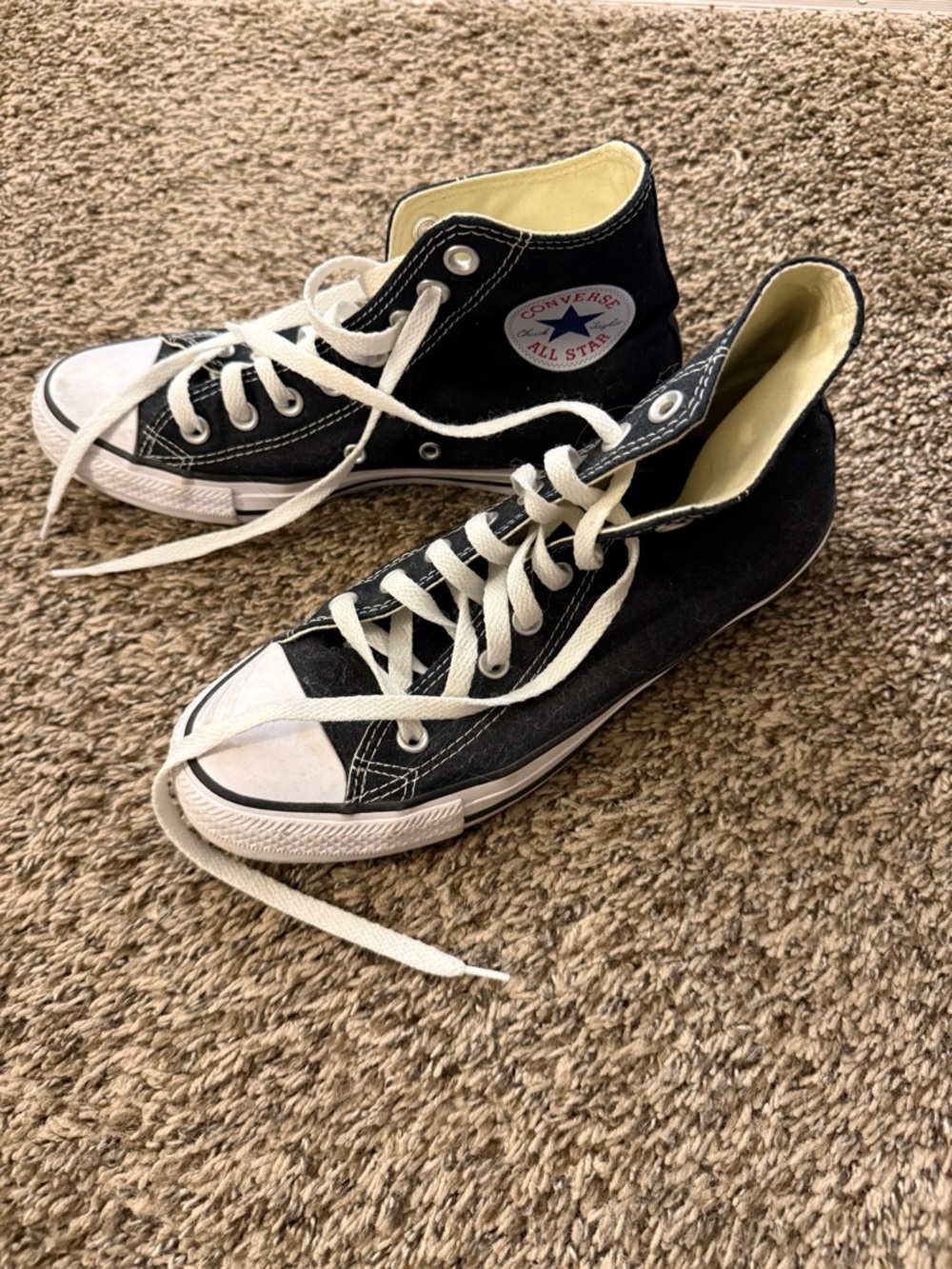 Converse High Top Sneakers in Black and White